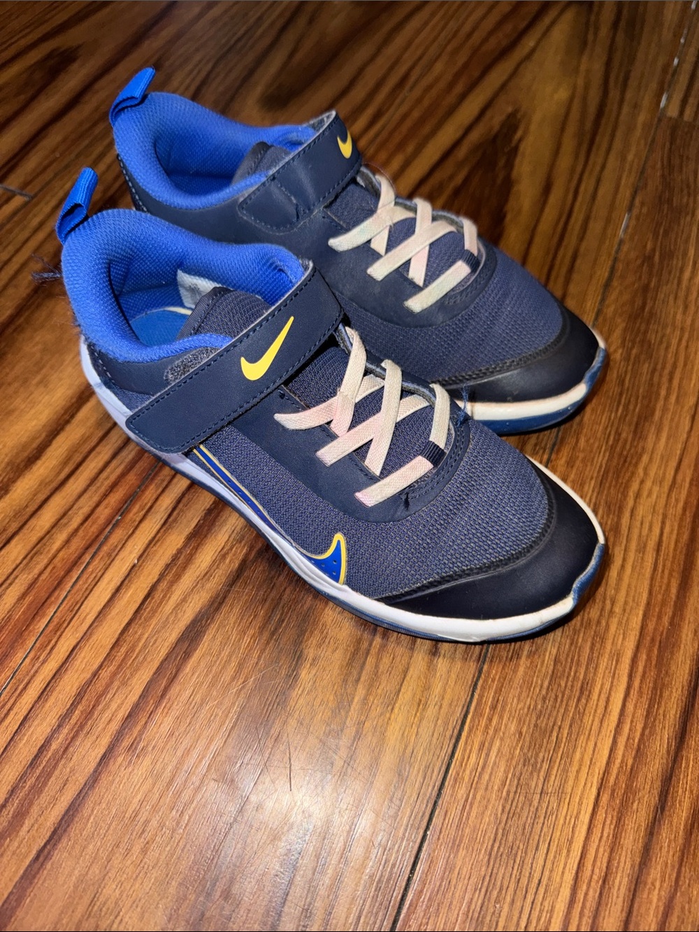 Nike Kids Navy and Royal Blue Sneakers with Yellow Swoosh